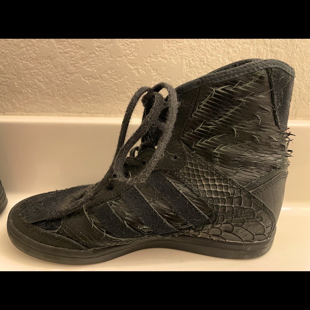 Adidas black high-top. Like New